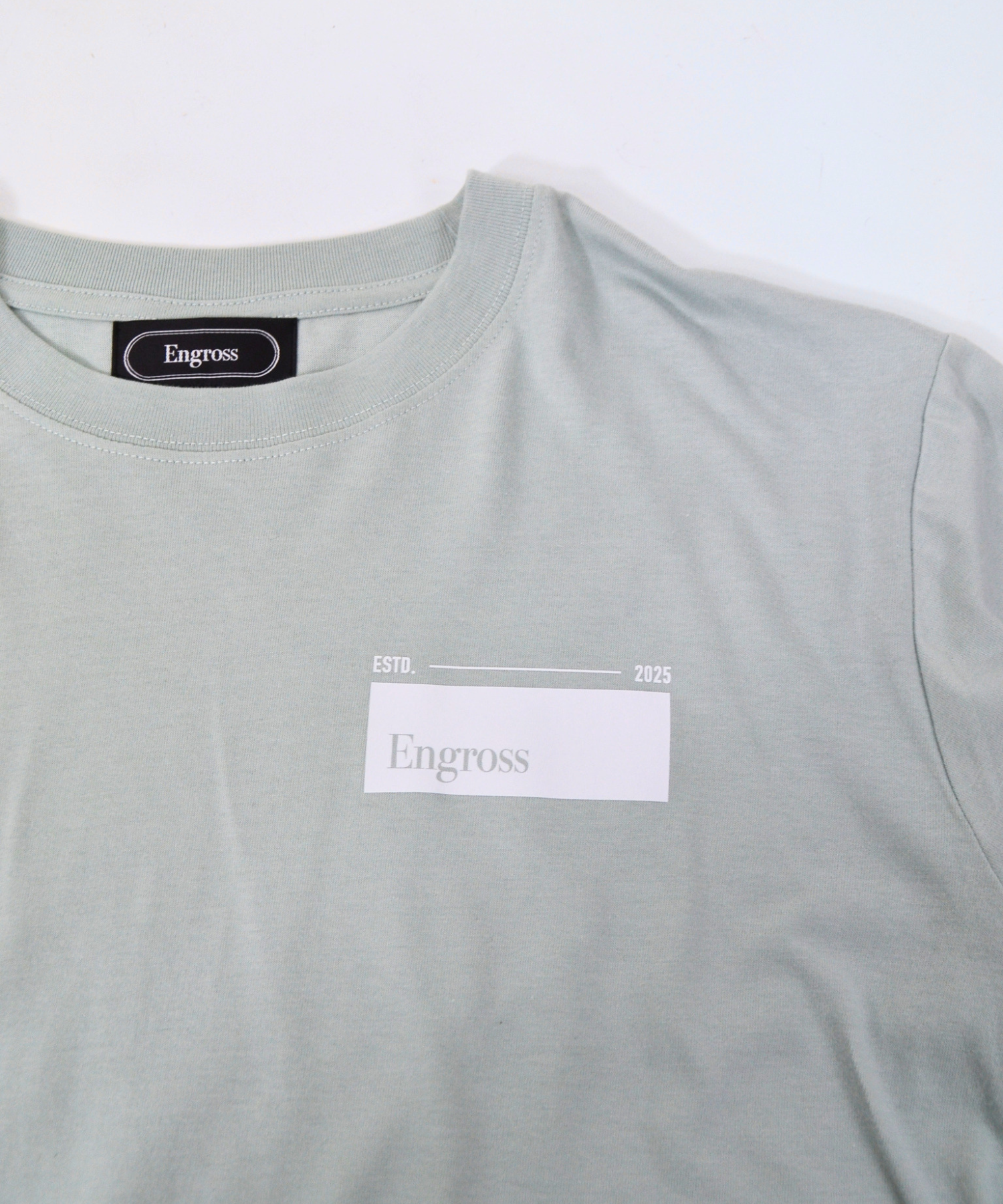 アスレジャーブランド Engross（エングロス）のOrganic Cotton Long Sleeve T-shirt（オーガニックコットンロングスリーブTシャツ）ライトグリーン ロゴ