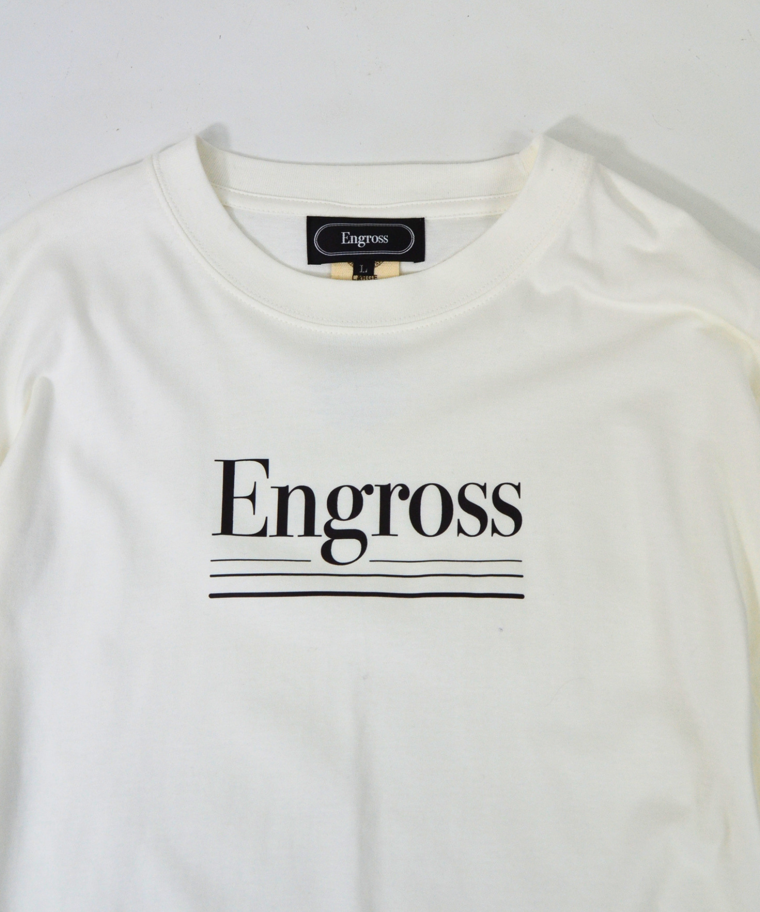 アスレジャーブランド Engross（エングロス）のOrganic Cotton Long Sleeve T-shirt（オーガニックコットンロングスリーブTシャツ）ホワイト ロゴ